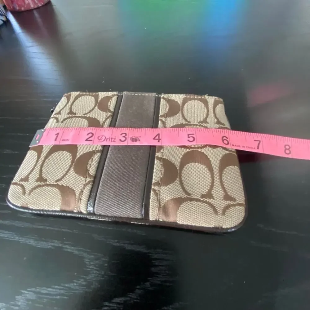 Mid 2010s coach archive signature wristlet clutch wallet